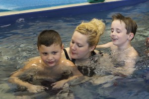 Bethany Swimming  with  Students at the Building Blocks Summer Program 2012